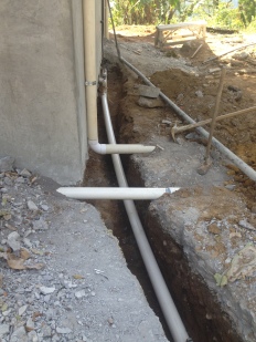 the ditch that connects the house to water and power